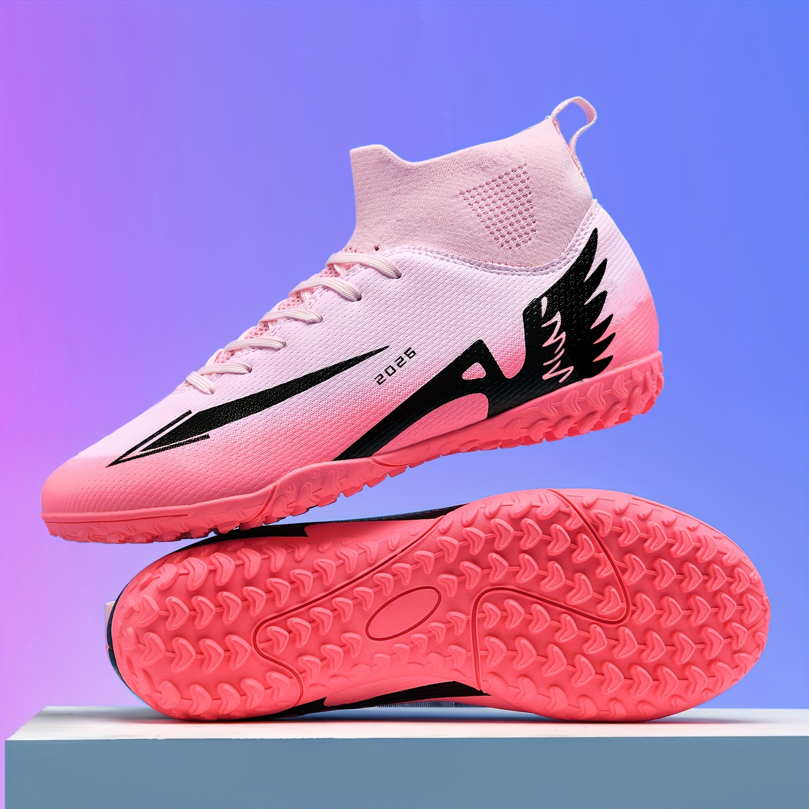 Adult high-top football shoes advertised with TF studs