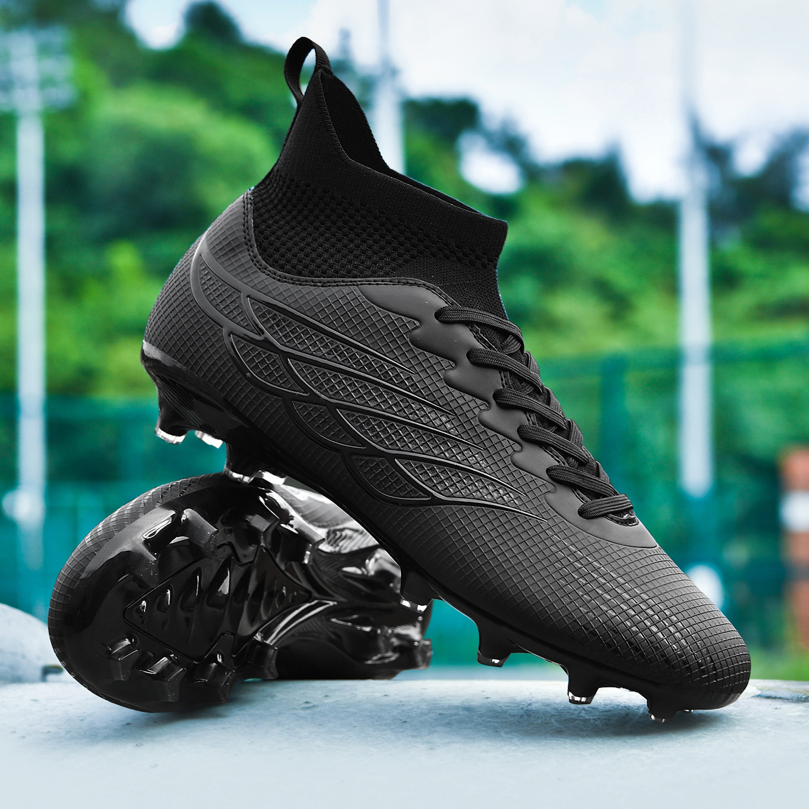 Black high-top football boots advertised as AG